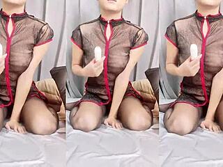 Chinese babe’s big tits tempt in black silk
