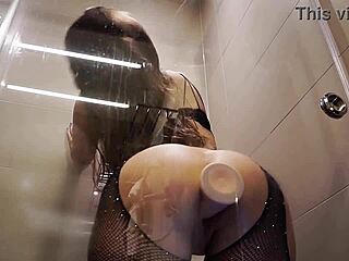 Cheeky Babe Rides Dildo in Bathroom Stall