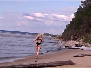 blonde with big tits charging at sea