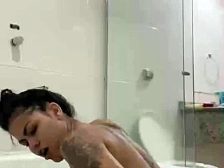 bia morena masturbates with bathtub jet