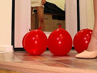Cute Skinny Girl In Miniskirt Crushes Balloons