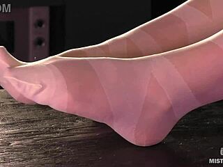What’s this goddess hiding under nylon feet on table?