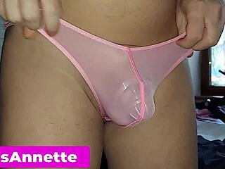 Femdom teasing with metal chastity belt cage