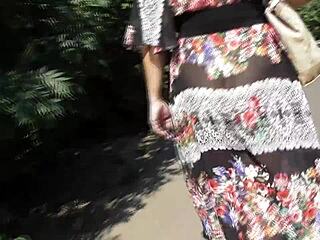 I caught a hairy mature flashing in see-through dress outdoors