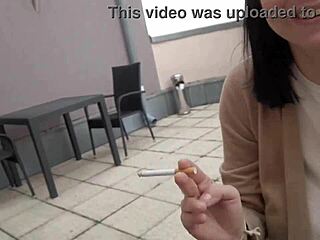 smoking casually on the taras with my big tits girlfriend, capturing two neighbor videos naturally.
