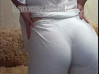 hey, check this horny brunette stripping and showing ass