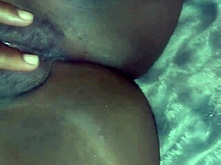 in her first solo act the curvy black babe spreads legs for close-up fingering of her tight shaved pussy