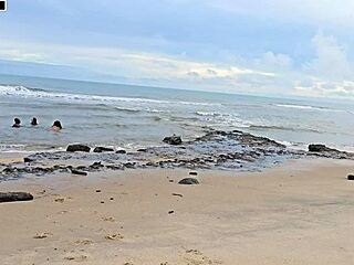 Playful game leads to intense group banging on busy beach with creampie finishes