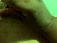 my wife performs a relaxing hand massage for me in our bedroom