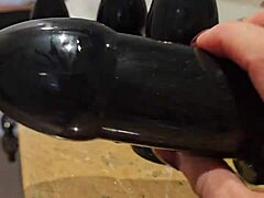 Watch this redhead slut orgasm from huge anal sextoy fucking!