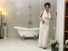 The asian girl shows her big tits in the bubble bath story.