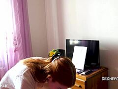 Beautiful naked redhead karolinka applies makeup while posing