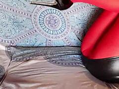 The Milf With Beautiful Legs In Red Pantyhose And Black Heels.