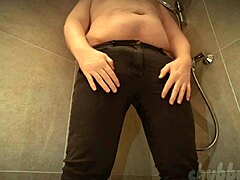 Chubbykaot pisses in jeans, spreading asshole!
