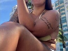 Exhibiting my big pussy on the beach