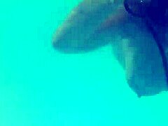 Melissa The Mermaid With Her Tattoo And Brown Eyes By The Pool