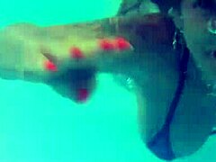 Melissa The Mermaid With Her Tattoo And Brown Eyes By The Pool