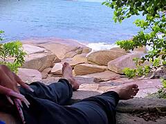 horny african amateur masturbates with handjob to surprise cum orgasm outdoors on public beach