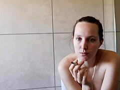 I love watching this cute girl next door smoke solo in the bathroom with her skinny body on display.