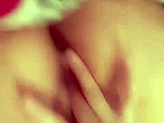 redhead slut spreads her shaved pussy for intense fingering session. she moans while teasing her HAIRLESS slit.