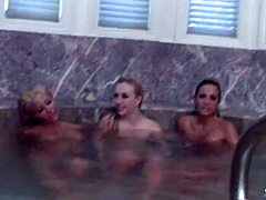 Abigail Mac dives into a steamy lesbian threesome with big tits brunettes, exploring oral pleasures and ass play behind the scenes.