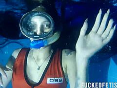 Helen Star models sexy swimwear during night apnea session in the pool