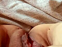 Why is this milf spreading her pussy so wide?