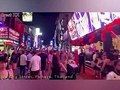 Walking down Walking Street in Pattaya on Halloween 2024 with neon lights shining and sexy costumes all around