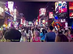 Walking down Walking Street in Pattaya on Halloween 2024 with neon lights shining and sexy costumes all around