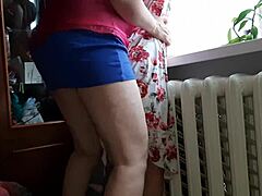 Amateur stepdaughter in a short dress and miniskirt gets passionate strapon fucking from stepmom leading to intense orgasm while husband is at work
