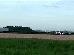 This little teen girl says she's getting cum all over her face in a public gangbang threesome