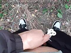 What happens when two women explore desires in a secluded forest setting, risking exposure outdoors