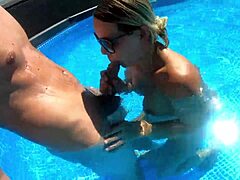 Watch this pregnant young milf dive into pool sex while teasing neighbors with braces!
