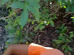 she faces unexpected destruction amid the outdoor bushes