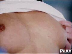 Two Attractive Women Sharing Intimate Touches In The Kitchen