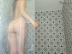 in this casual story, a sexy brazilian housewife takes a steamy shower, dancing sensually with her big ass and lingerie in the bathroom.