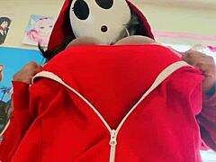 In a whimsical twist, Shyguy suddenly grew big massive boobs. The cute nerd explored self sucking his huge saggy tits curiously.