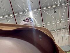 This guy secretly films a woman with hidden phone as she masturbates her big tits while shopping in the supermarket.