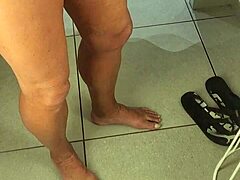 Tempting handjob strokes in the fitting room.