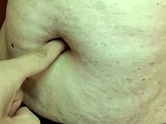 curious hands explore latina milf's soft belly in fetish massage