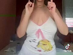 who wouldn't explode watching this busty brunette's huge natural tits bounce