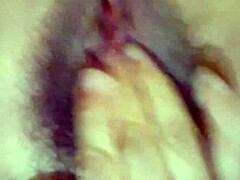 horny chubby mature neighbor fingers her huge wet hairy pussy on bed close-up