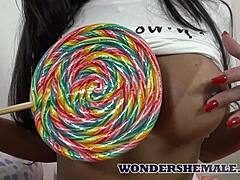 latina shemale's bubble ass jiggles while she rips clothes and strokes thick cock