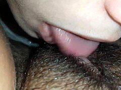 wet brunette lesbians dive into hairy pussy licking and clit sucking up close!