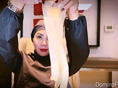 nurse snaps on latex gloves for patient's asmr checkup