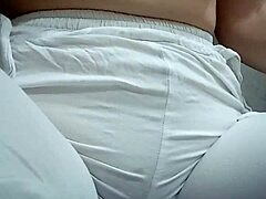 Close-Up View of Woman Urinating from Spread Pussy Lips in Detail