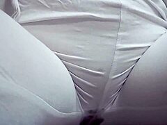 Close-Up View of Woman Urinating from Spread Pussy Lips in Detail