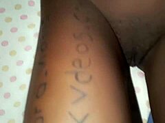 Ebony woman shows smooth shaved hairless pussy in quick verification clip