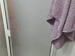 voyeur masturbates to stepsister's shower until she grabs his hard cock