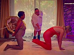 mistress april's latex femdom strapon fucks bound ebony slave?